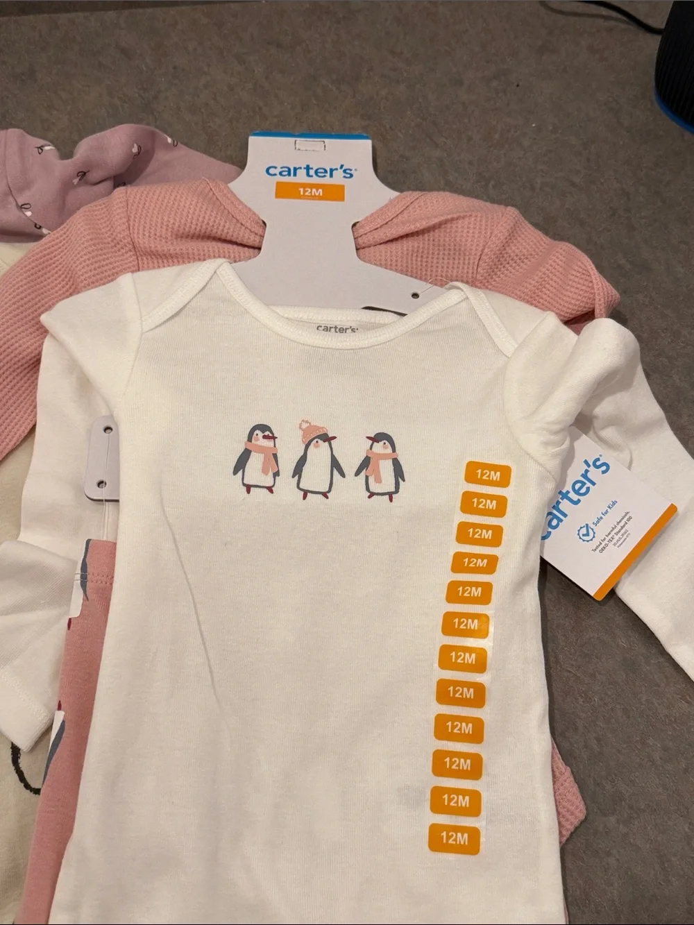 2 carters girls 12 month 3 pack sets. Includes pants shirt and  onesie